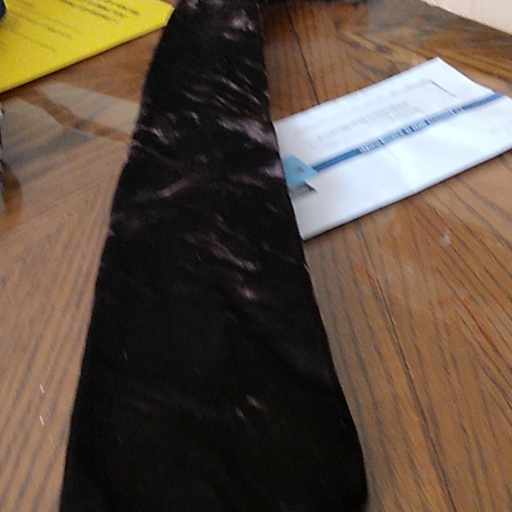 A dark brown chess tie